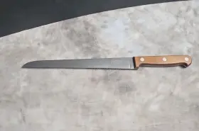 M-920 CORNING CUTLERY Serrated Knife Tang Wood Handle Blade