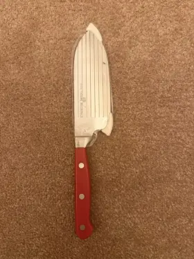 032010 WOLFGANG PUCK Horizontal Santoku Knife