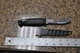Rapala Bait Knife 4" black plastic handle & scarab  used see pictures