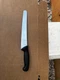 Mercer M23210 Bread Knife, Black Handle Shown In Pictures