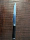 Kai Shun Classic Carving Knife with a 7.87"x1" blade