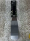 Mercer Culinary Millennia 8"x3" Gluten Safe Stainless Steel Turner Black Handle