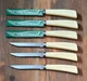 QUIKUT - QUIKKLE - SET OF 7 - SERRATED - STAINLESS - KNIVES