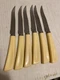 (6) vintage Quikut Quikkle serrated steak knives cream color handles