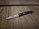 Cutco 1720 KB paring knife 2-3/4" blade dark brown handle.