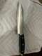 J.A. Henckels International German Stainless Steel 11359-180 (7") Chef's Knife
