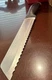 J.A HENCKELS&rsquo; INTERNATIONAL &ldquo;SILVER CAP&rdquo; 8" BREAD KNIFE (#13576 200). EUC!