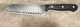 Wusthof Gourmet 7" Santoku Knife Hollow Edge Black Handle
