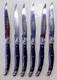 Used Set of Six Identical Gold Coast-brand Steak Knives, black handle, stainless